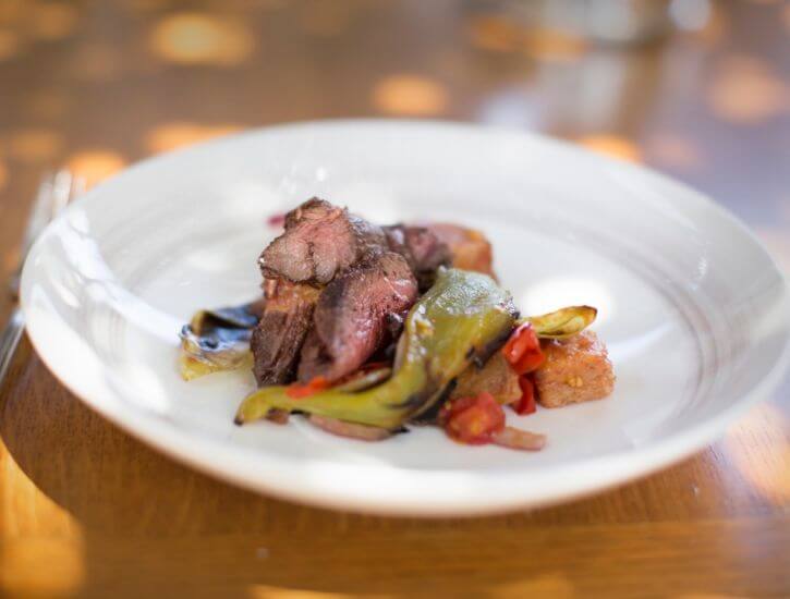 Cumin & Chili Spiced Beef Loin with Roasted Cherry Tomatoes, Charred Peppers & Toasted Bread