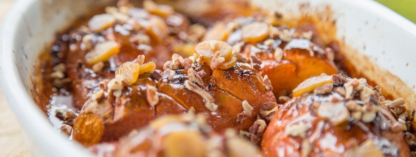 Roasted Garnet Yams Glazed with Brown Sugar and Orange with a Ginger, Pecan Topping